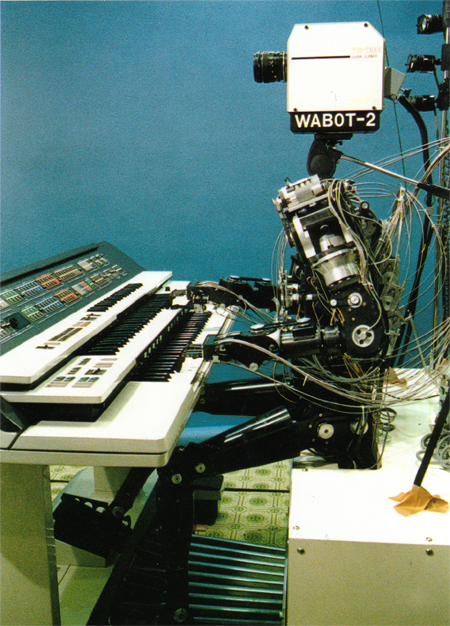 robot sitting at a keyboard